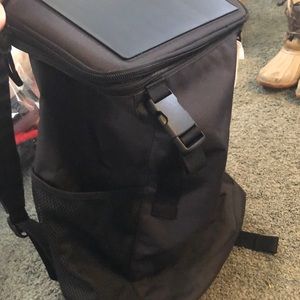 Solar powered charging backpack